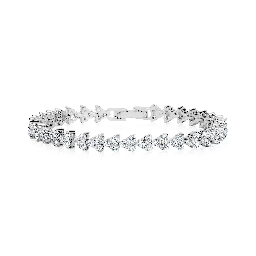 Three crystal prong tennis bracelet